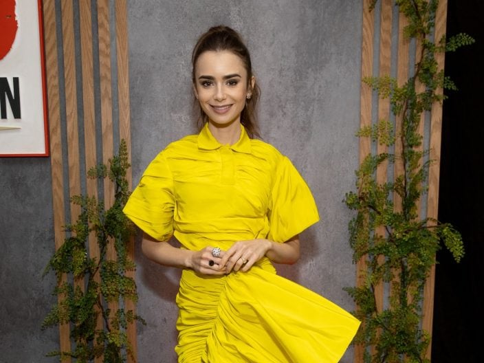 Lily Collins vestita di giallo ad una premiere